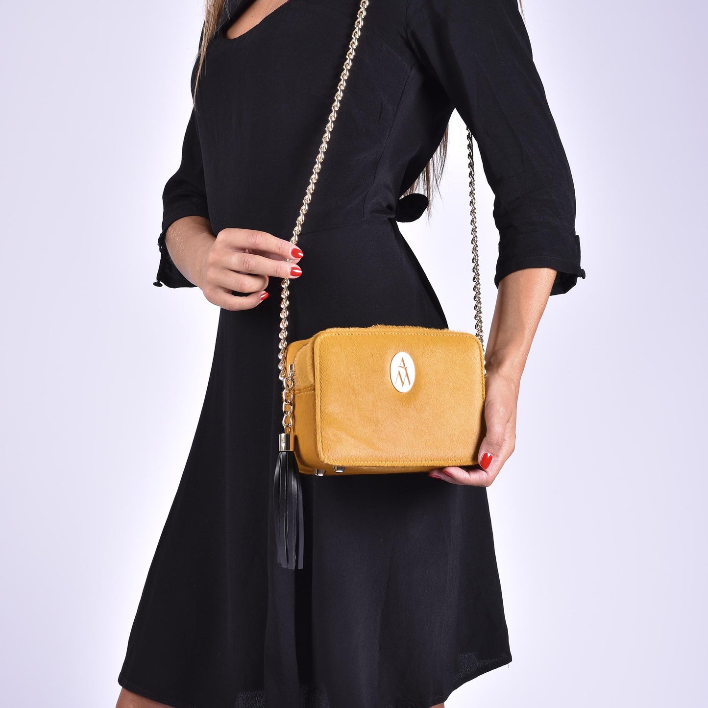 bolso amarillo de potro