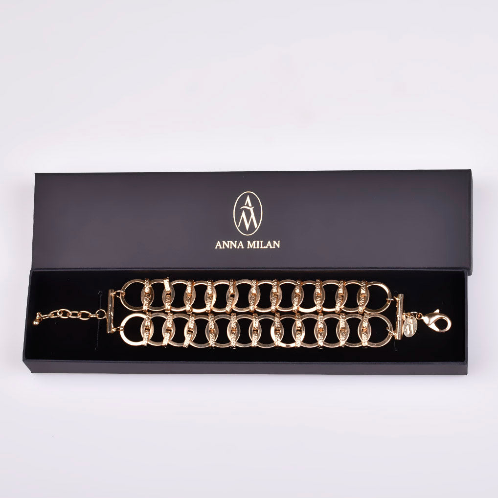 Pulsera Bañada en Oro con Doble Aros