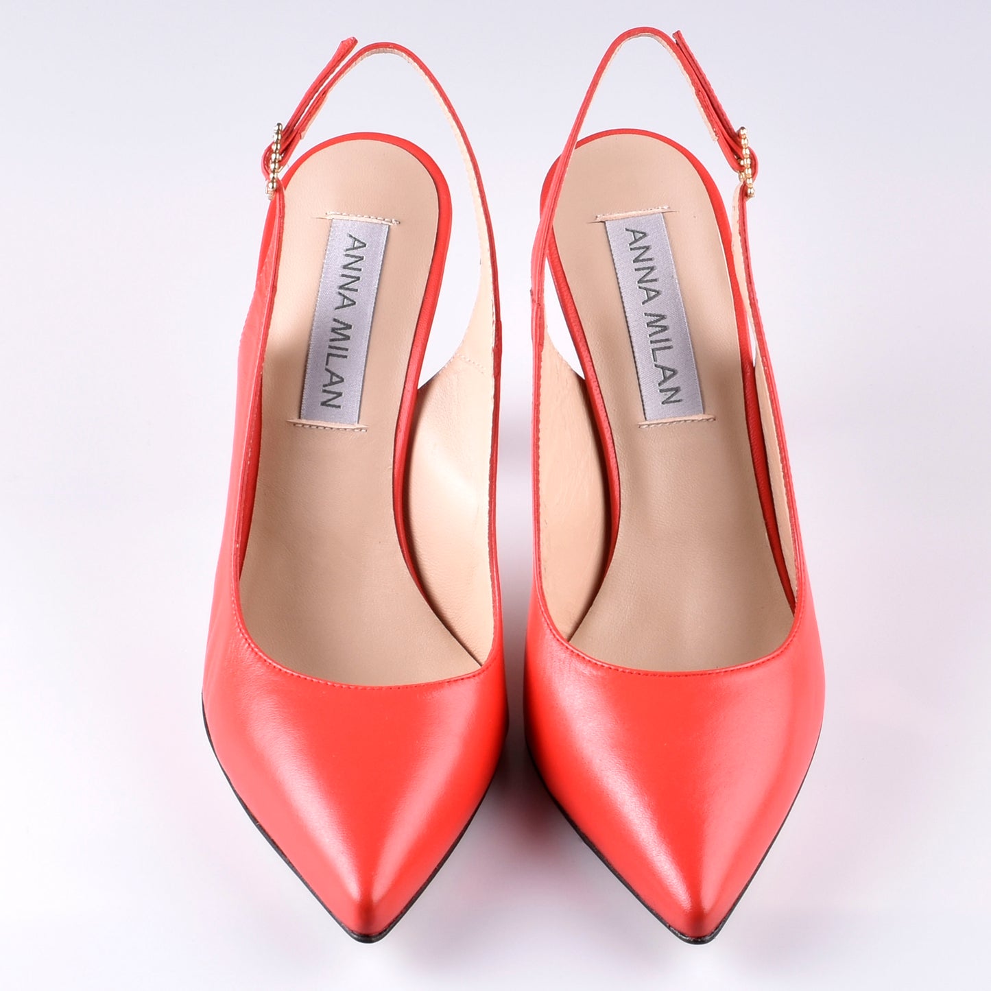 Java-rote Slingpumps