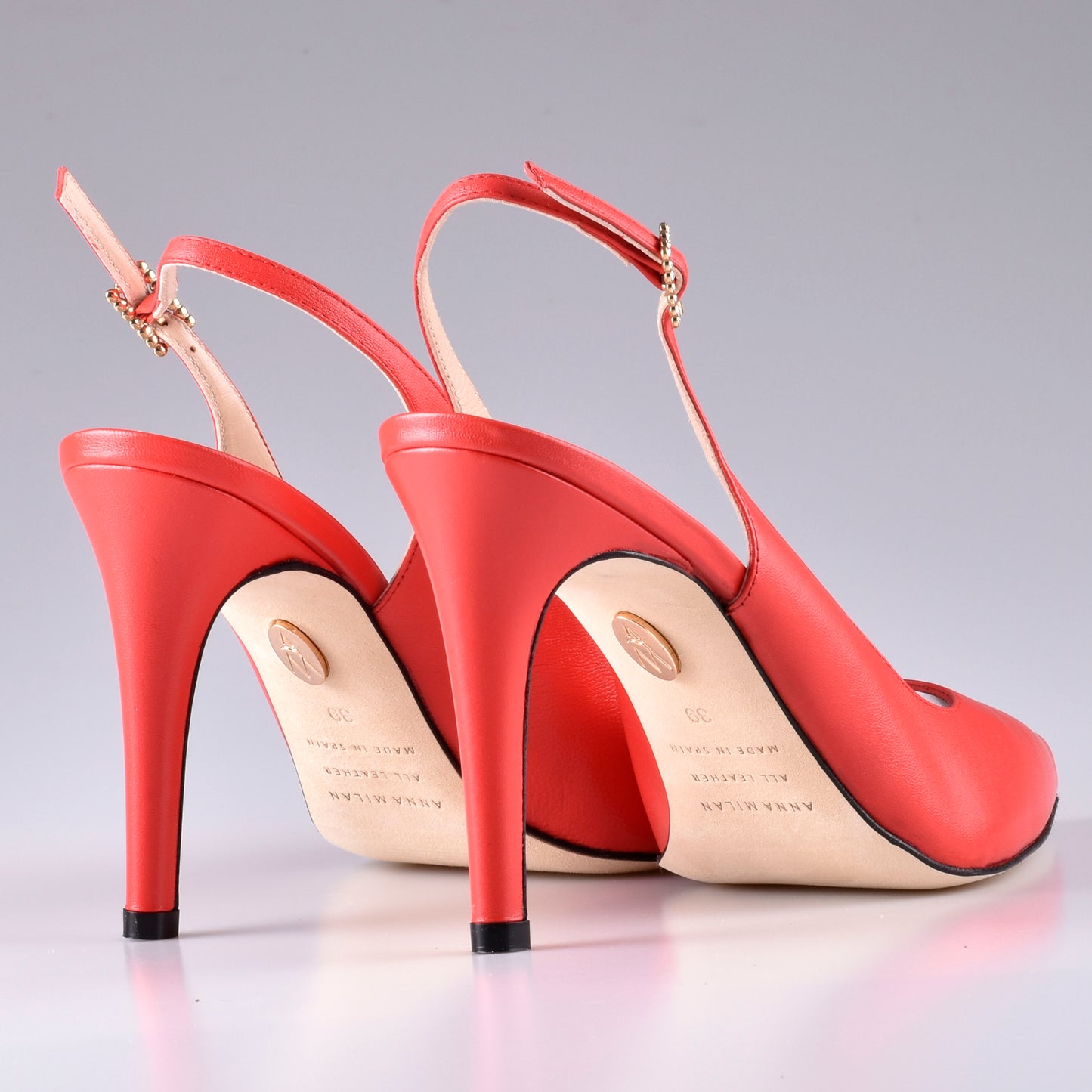 Java-rote Slingpumps